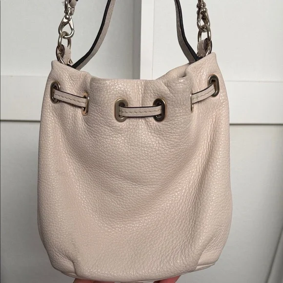 Kate Spade Pebbled Leather Drawstring Bucket Bag in Light Beige/White - Picture 4 of 10
